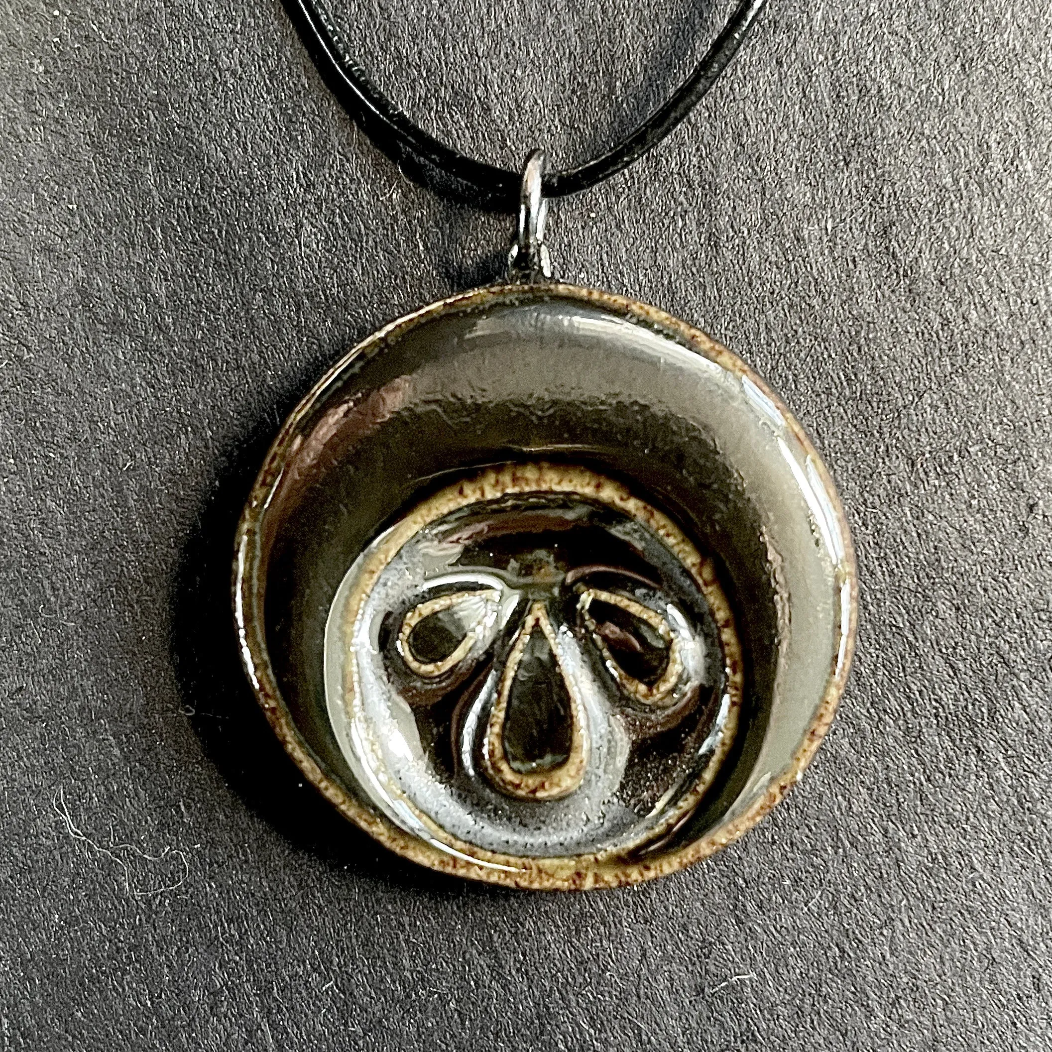 silver ceramic pendant